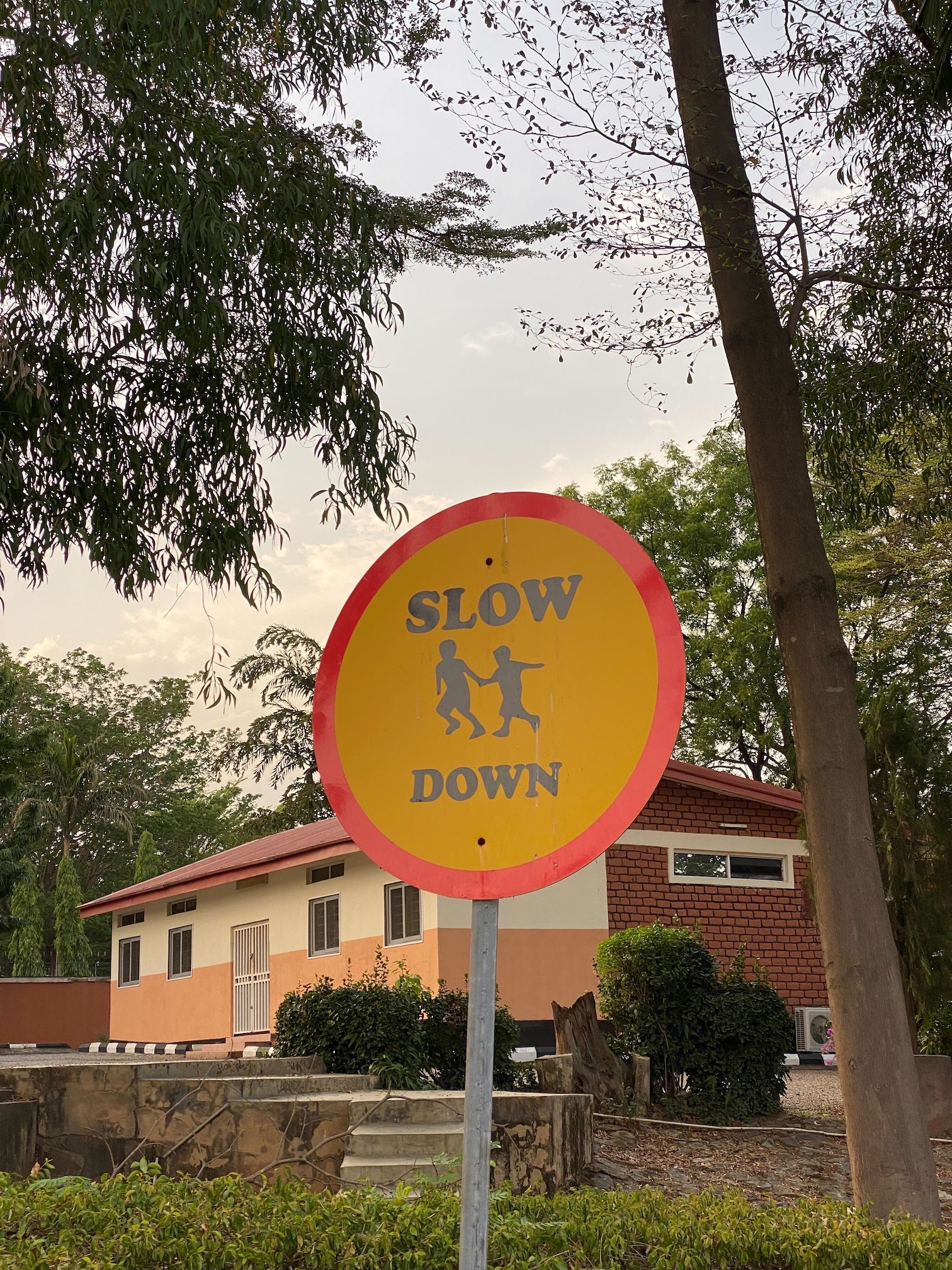 A sign that says 'Slow down'